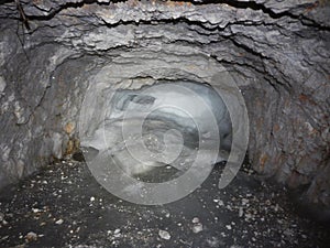 First world war tunel with ice at tofana di dentro in dolomites