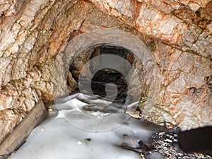 First world war tunel with ice at tofana di dentro in dolomites