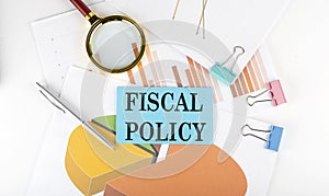 FISCAL POLICY text on the sticker on the paper diagram