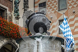 Fischbrunnen fountain in front of the New City Hall of Munich at Marienplatz, Germany, 2015