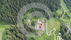 Fischburg in Val Gardena seen from above, aerial view of the Fischburg in Santa Christina and Selva. Top down view of a Castle