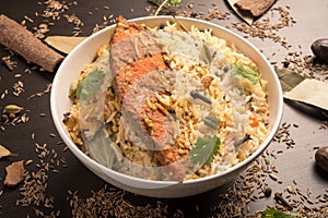 Fish Biryani in a white bowl