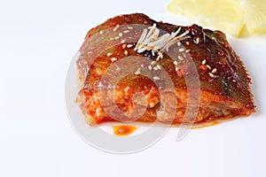 Fish boiled in spiced gochujang sauce.