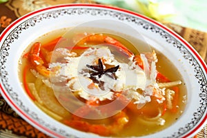 Fish bouillon with vegetables photo