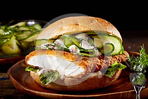 Fish burger with crumbed fillet of fish photo