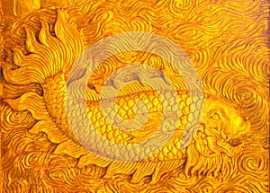 Fish carve gold