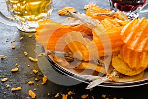 Fish and chips close-up on a beer background