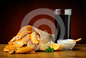 Fish, chips and cola drink