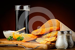 Fish and chips with cola drink