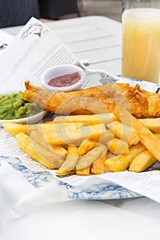 Fish and Chips with mushy peas served in the Pub
