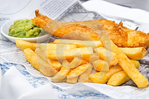 Fish and Chips with mushy peas served in the Pub