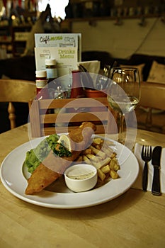 Fish & chips served with mushy peas