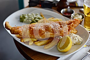 Fish and chips served in a pub