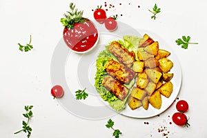 Fish and chips with tomato sauce ketchup, white background, top