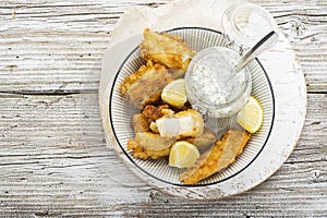 Fish dish - Cod in beer batter with tar tar sauce for a healthy and comfortable diet