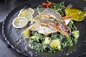 Fish dish with fillet sea bass and chard with potato