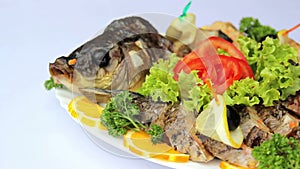 Fish dish with vegetables, stuffed with fish, seafood