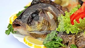 Fish dish with vegetables, stuffed with fish, seafood