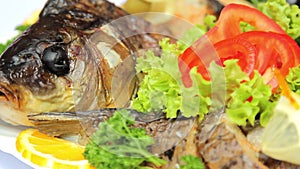 Fish dish with vegetables, stuffed with fish, seafood