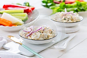 Fish and egg paste or salad with raw snack vegetables, healthy snack