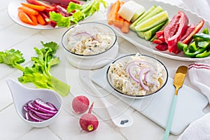 Fish and egg paste or salad with raw snack vegetables, healthy snack