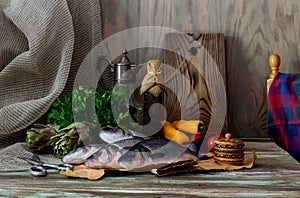 Fish european bass Dicentrarchus labrax on a wooden table