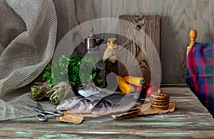 Fish european bass Dicentrarchus labrax on a wooden table