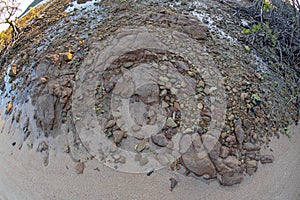 Fish Eye Lens Rounded View Of A Stoney Beach