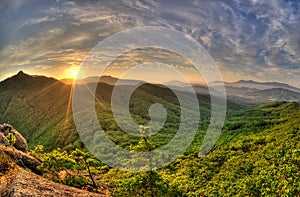 Fish-eye view of majestic sunset of the Primorye mountains