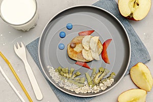 fish face shape snack from pancake,banana,apples. Cute kids childrens baby\'s breakfast,sweet dessert, healthy lunc