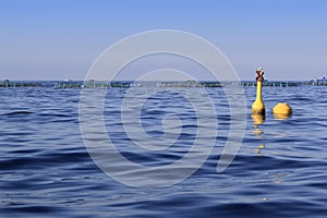 Fish farm on blue ocean sea horizon