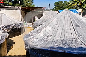 fish farm inside. containers with water and fish