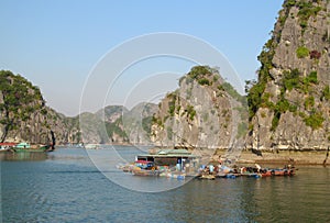 Fish farm between rock island in the sea