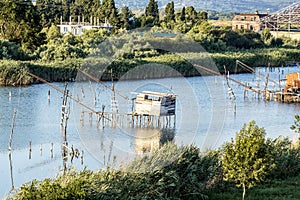 Fish farming,traditional fishing net, Old Fish trap at laguna in Ulcinj in Montenegro. Fisherman Cabins at Port Milena Canal. Old