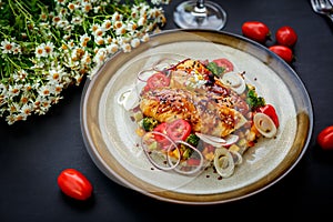 Fish fillet with sesame rice, and vegetables, healthy food on a decorated table