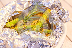 Fish fillets cooked with asparagus and potato