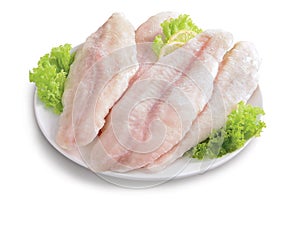 Fish fillets on a plate on white background