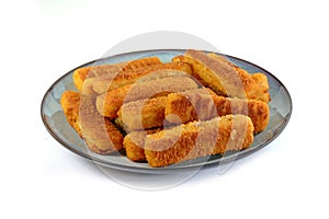 Fish fingers on plate isolated,