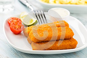 Fish fingers and potato salad