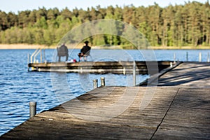 Fish fishing at a lake in central europe. Anglers fishing on the