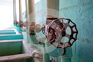 Water Valves Inside a National Fish Hatchery Long Abandoned at Elephant Butte State Park built in 1937. photo