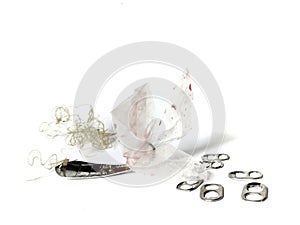 Fish hook with marine litter on white background. plastic bag. pollution concept