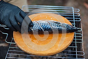 Fish mackerel on a wooden board