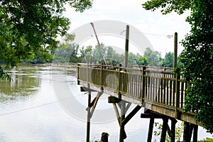 Fish net pontoon on wooden hut cabin for fisherman in pauillac gironde estuary France photo