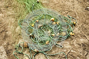 Fish nets And Floats On The Beach