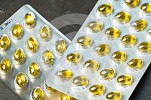 Fish oil capsules in blister pack. Place for your text.
