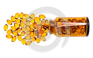 Fish oil capsules and bottle on white background