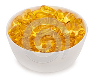 Fish oil, omega 3 in capsules in bowl