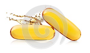 Fish oil softgel capsules on white background. Omega 3 dietary supplement