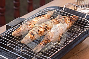 Fish perch baked at home on the grill